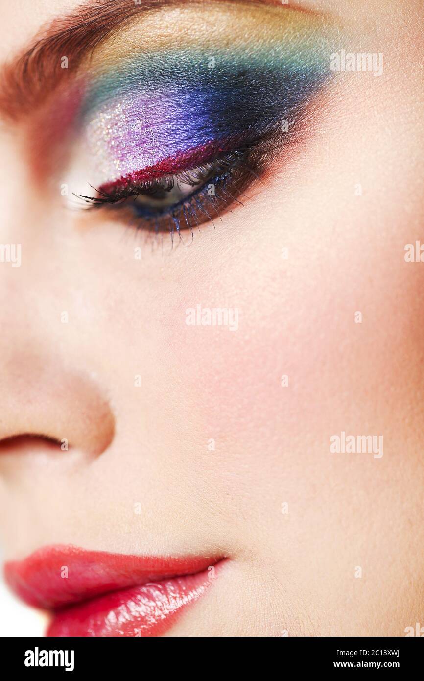 Close up portrait of a beautiful young blond model with bright make up ...