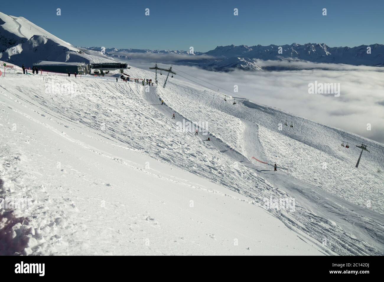 Ski slopes on the southern slope Aibga Ridge of Western Caucasus at Rosa Khutor Alpine Resort Stock Photo