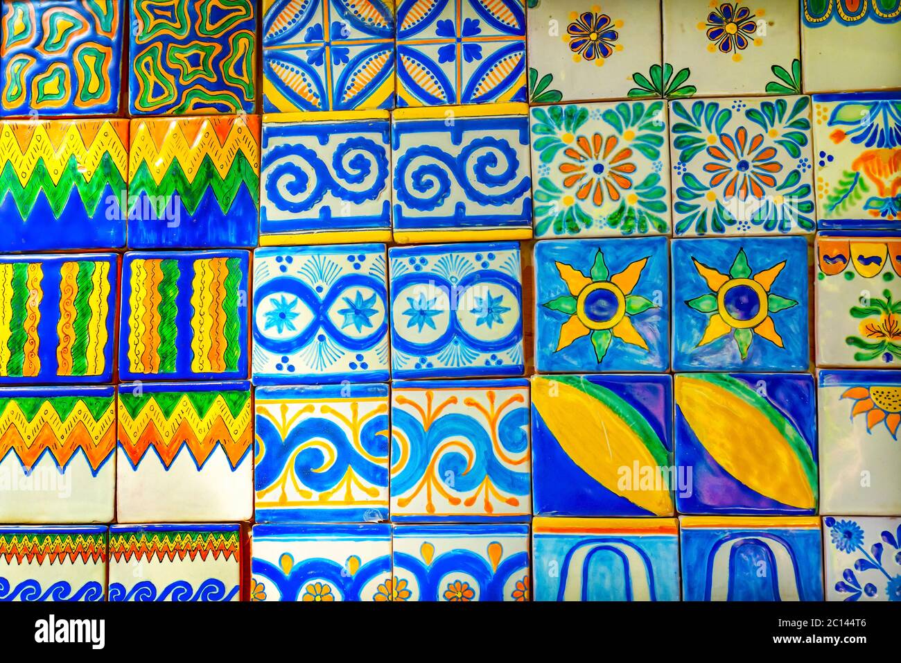 Colorful Blue Yellow Talavera Ceramic Tiles Native Decorations Puebla  Mexico.  Ceramics goes back 1000s of years and many ceramic factories in Puebla Stock Photo