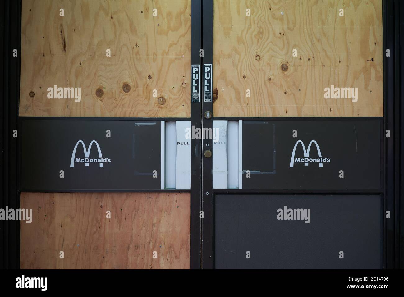 A temporarily closed and boarded up McDonald's restaurant in downtown Portland, Oregon, during the ongoing protest, seen on Saturday, Jun 13, 2020. Stock Photo