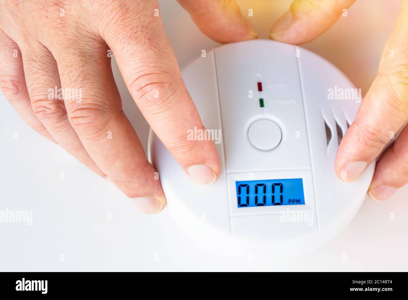 Installation of a smoke and fire alarm with carbon monoxide sensor capability Stock Photo