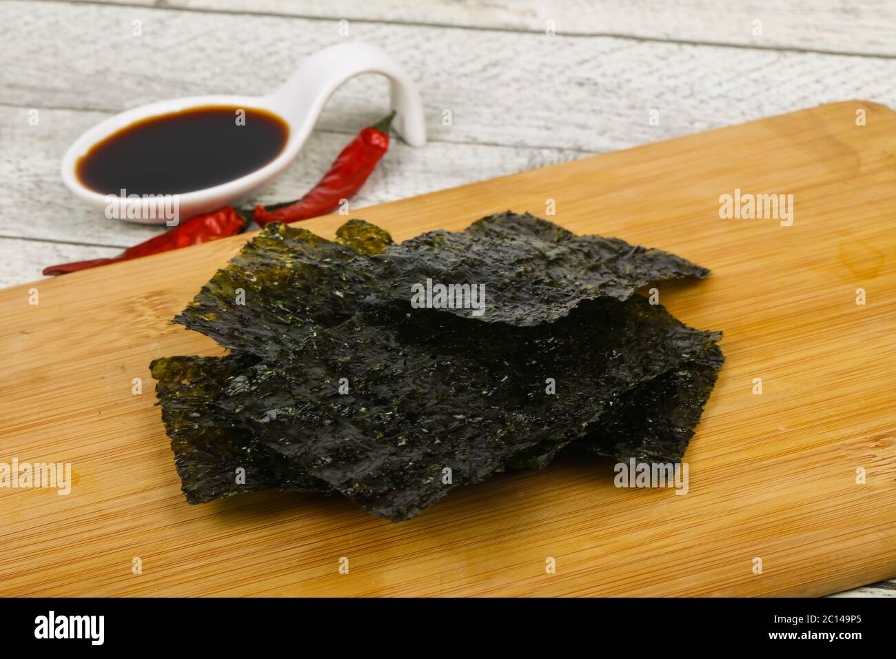 Tasty Nori chips with soya sauce Stock Photo Alamy