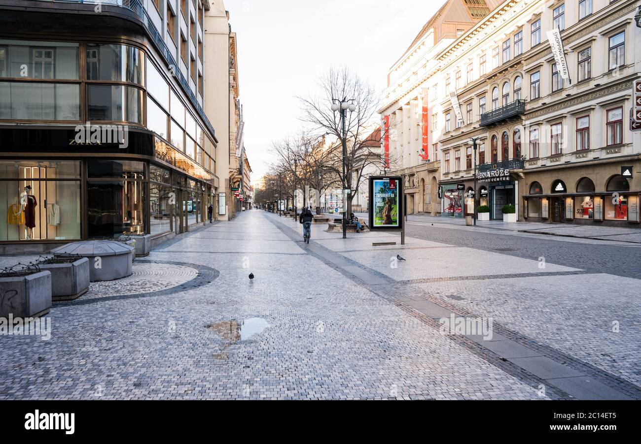 Quarantine Day, Empty streets of Prague during coronavirus. City people wearing face masks. Stock Photo