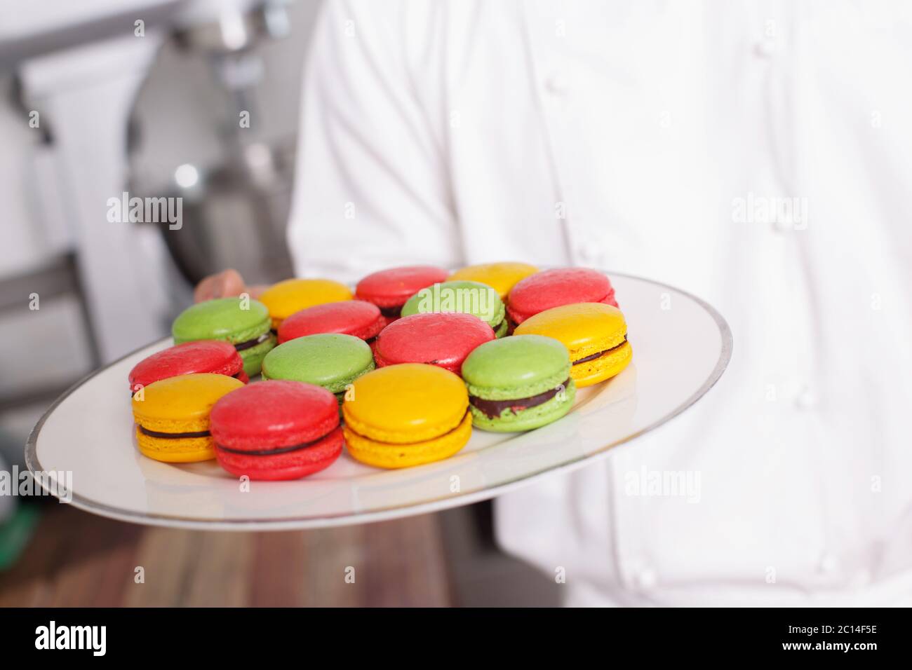 young man chelf makes food in kitchen Stock Photo - Alamy