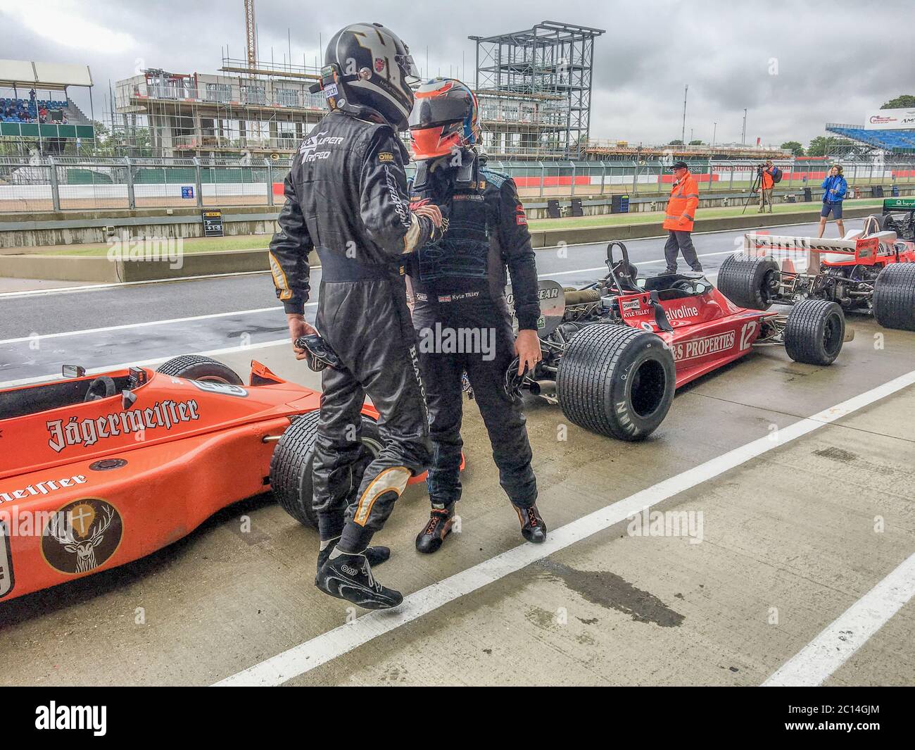 Drivers disagreement at the 2019 Silverstone Classic between Kyle Tilley and H Fletcher. Stock Photo