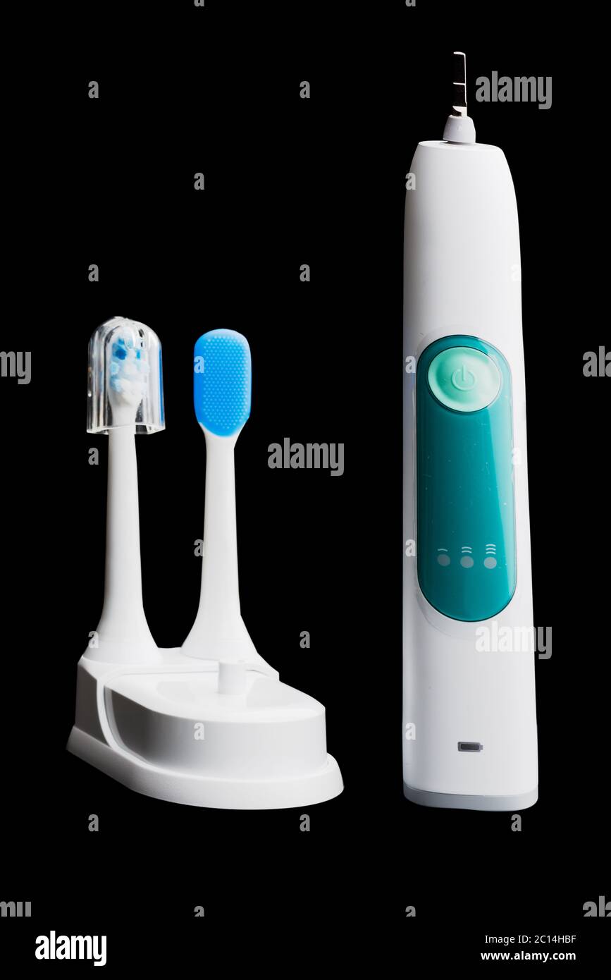 isolated power tooth brush on black Stock Photo