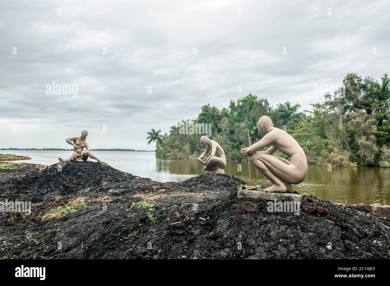life-size sculptures by Rita Longa at the reconstructed Taino village of Guamá, Cuba depicting the life of this indigenous tribe Stock Photo