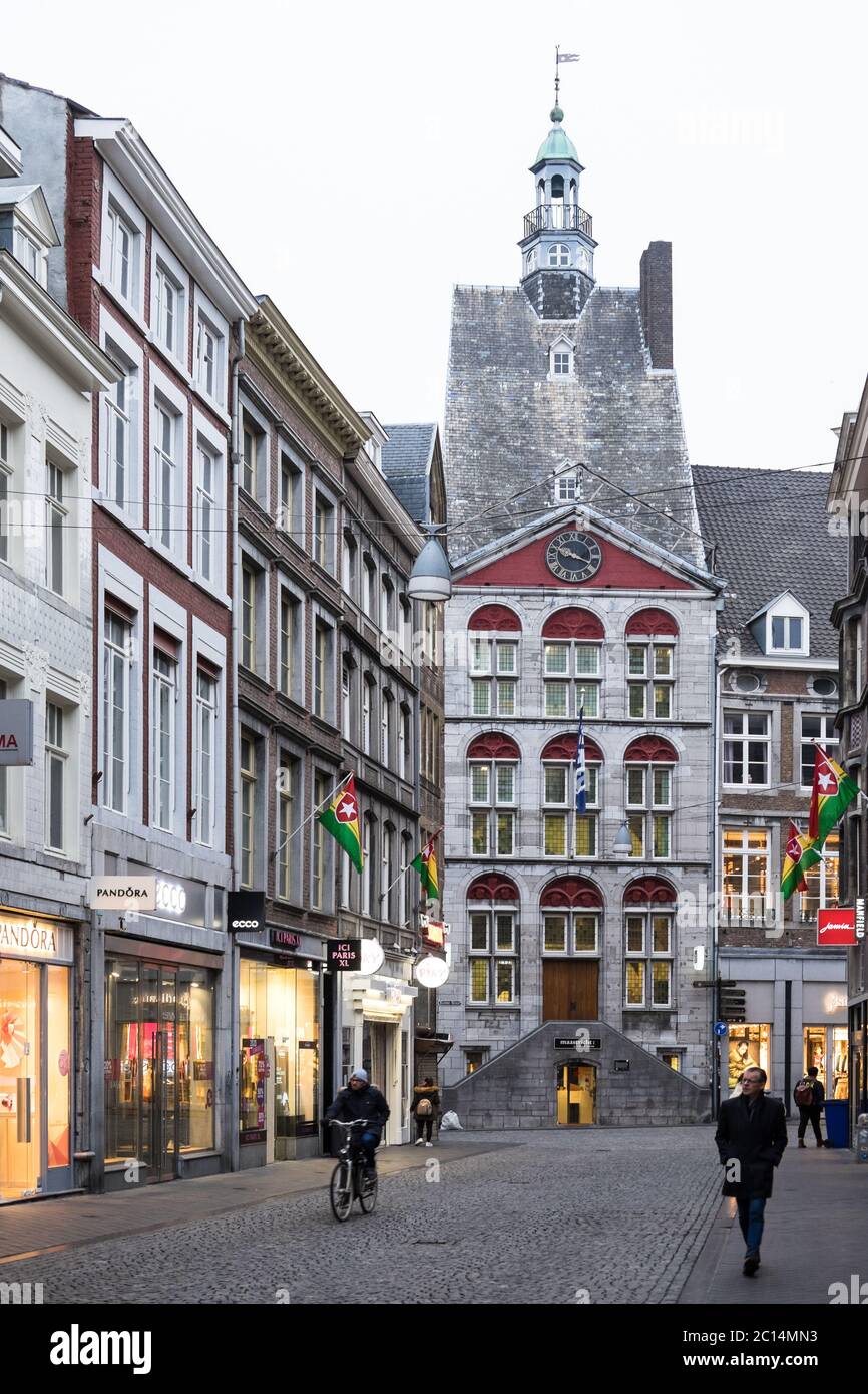 View from the Grote Straat at the Maastricht Visitor Center VVV located in  the so-called Dinghuis with clock face constructed in 15th century Stock  Photo - Alamy