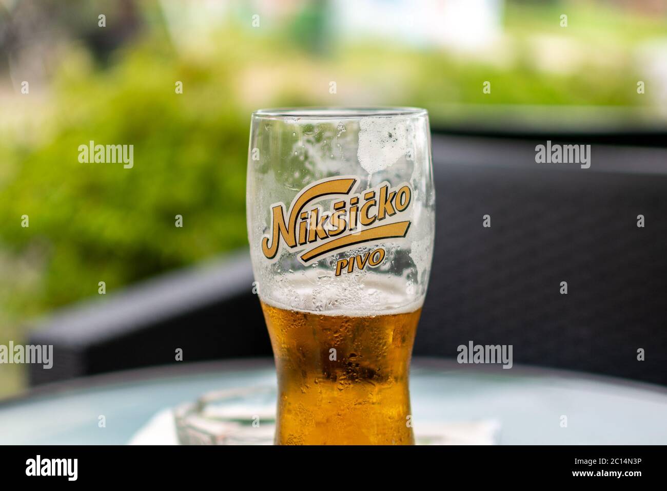 Belgrade / Serbia - May 23, 2017: Glass of cold Niksic Beer, served in a restaurant in Belgrade, Serbia Stock Photo