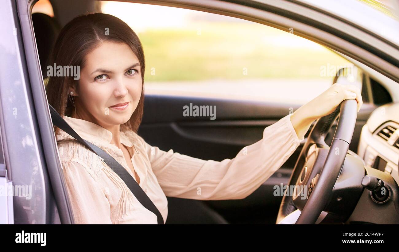 Young lady driver with automobile map hi-res stock photography and ...