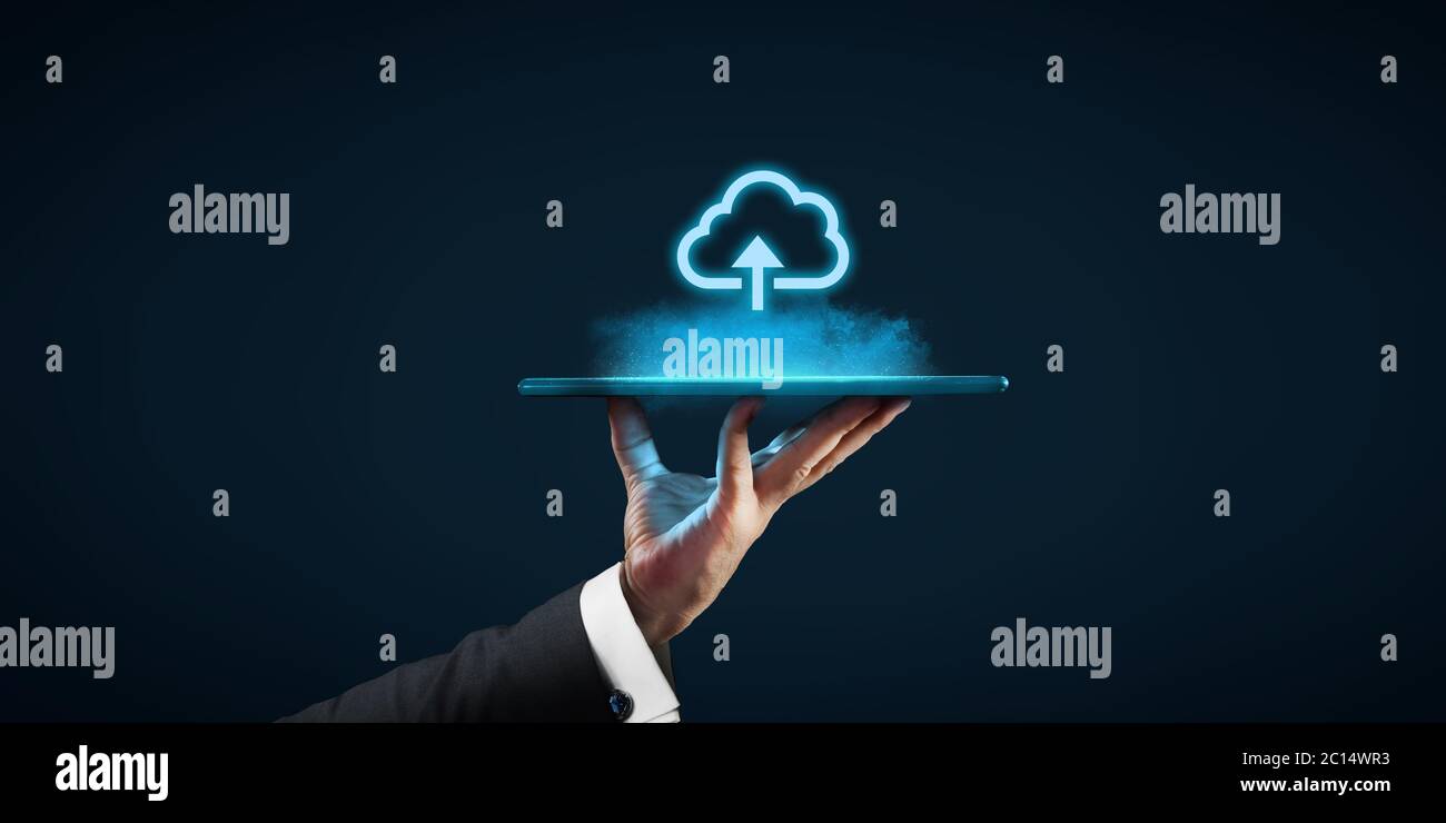 Cloud computing concept, connect devices to cloud. Businessman or information technologist with cloud computing icon and tablet. Stock Photo