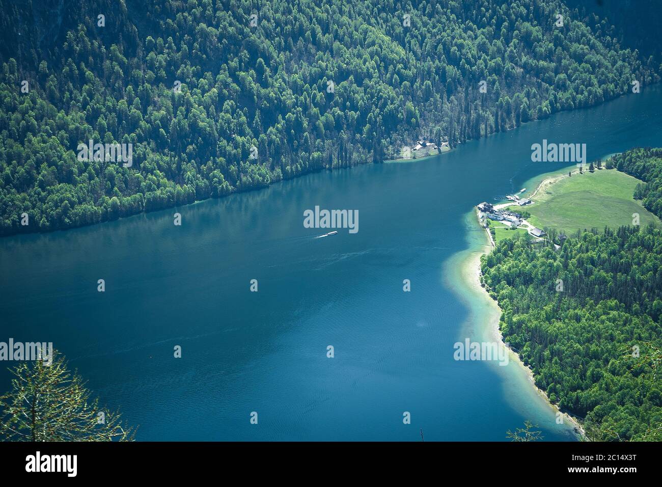 Panoramic view of Lake and Mountain in the background during a sunny day. Taken in viewpoint Archenkanzel, Konigssee lake in Berchtesgaden, Germany. Stock Photo