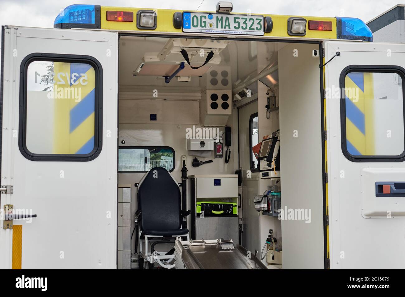 Interior view of the patient compartment of an ambulance van or emergency vehicle with medical equipment inside Stock Photo