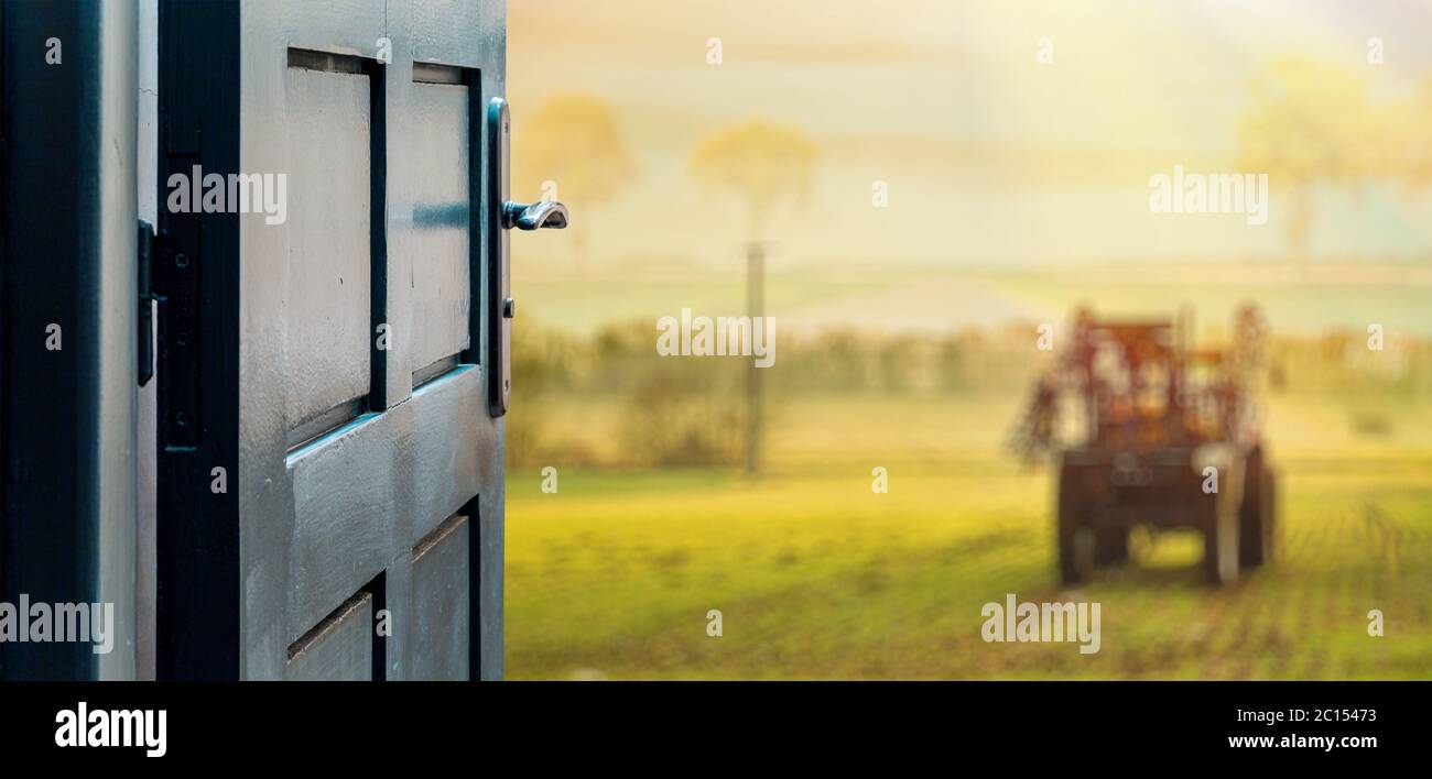 Opened door concept to beautiful and imaginary landscape of contryside Stock Photo