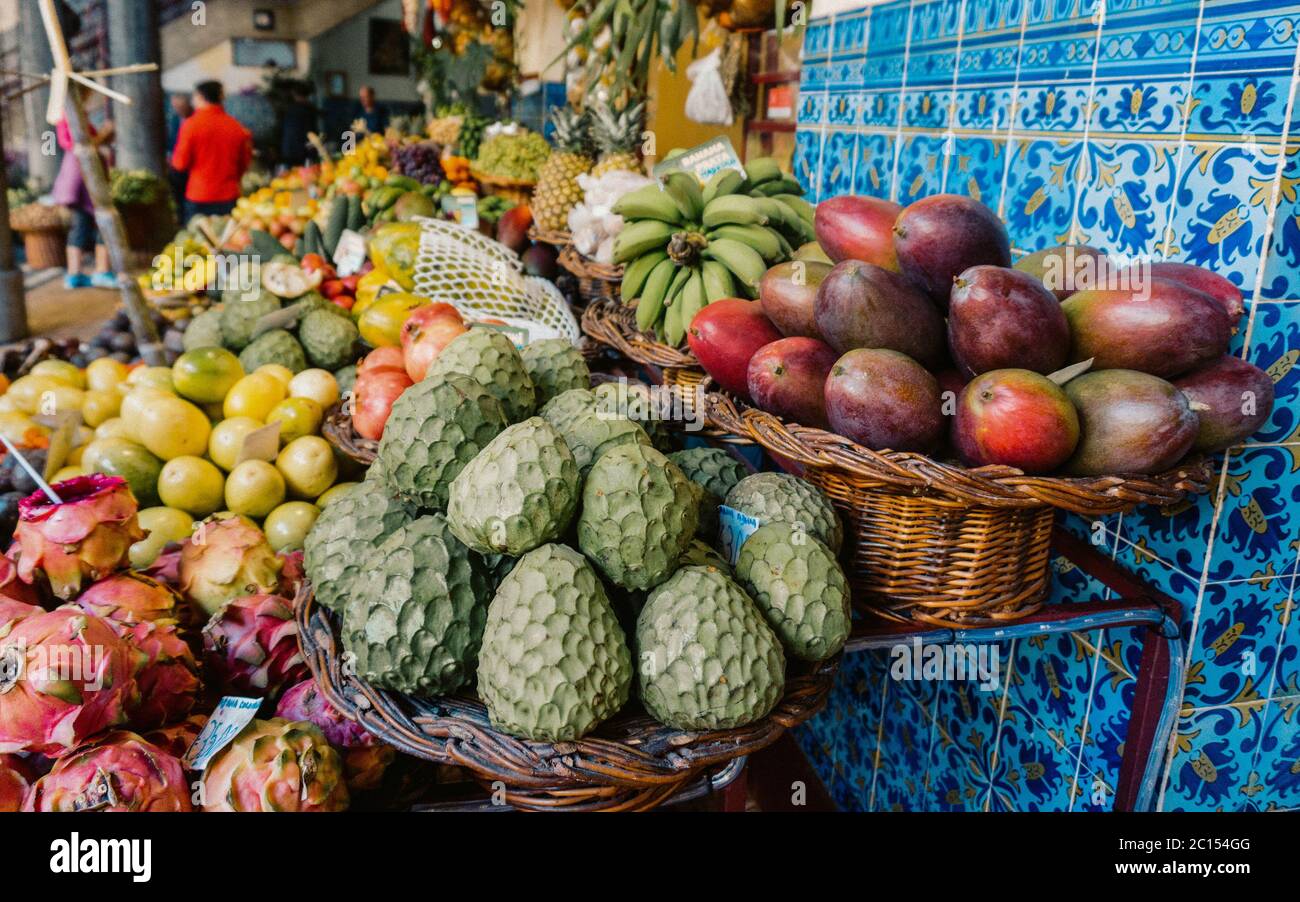 Fresh and ripe exotic fruits on traditional farmer market Mercado dos
