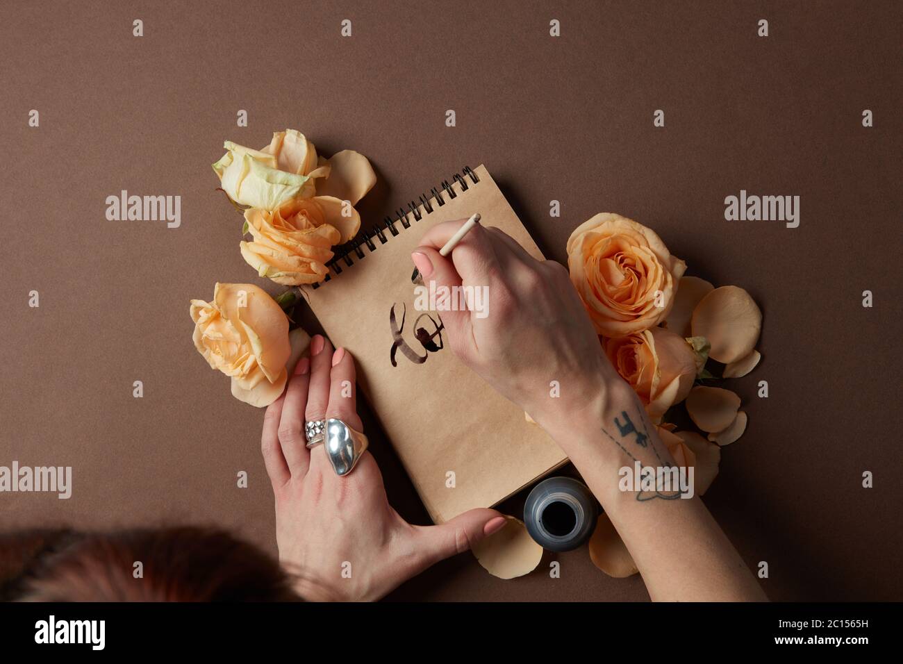 Hand writing a love letter Stock Photo