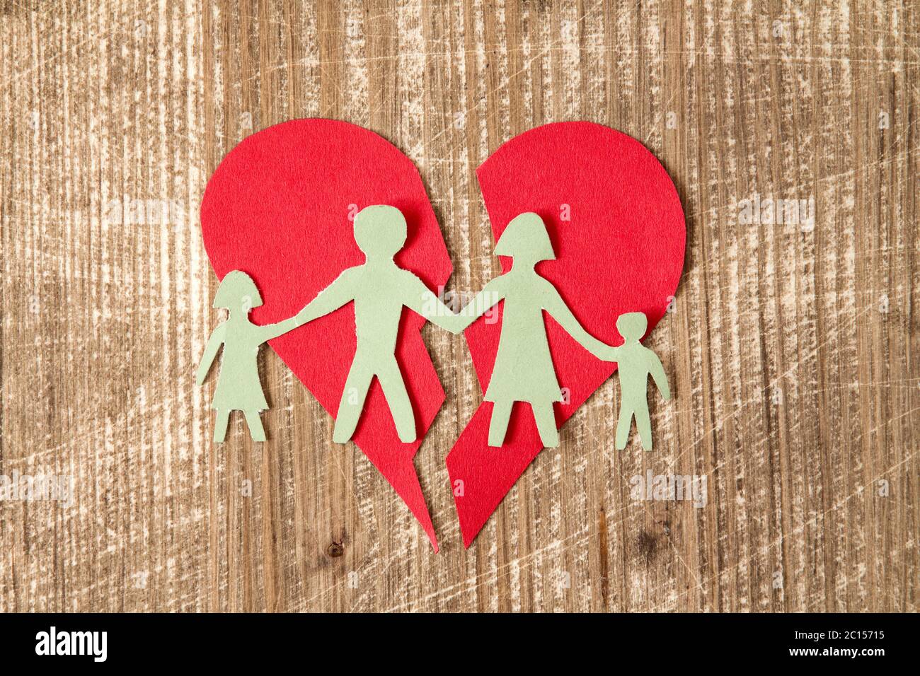 Paper family with broken heart Stock Photo