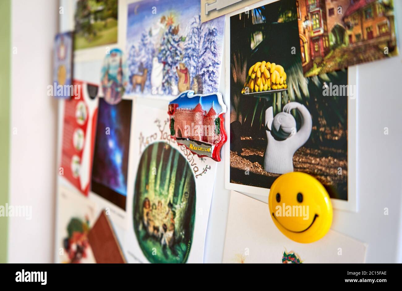 Collage of images and magnets with a smiling face Stock Photo
