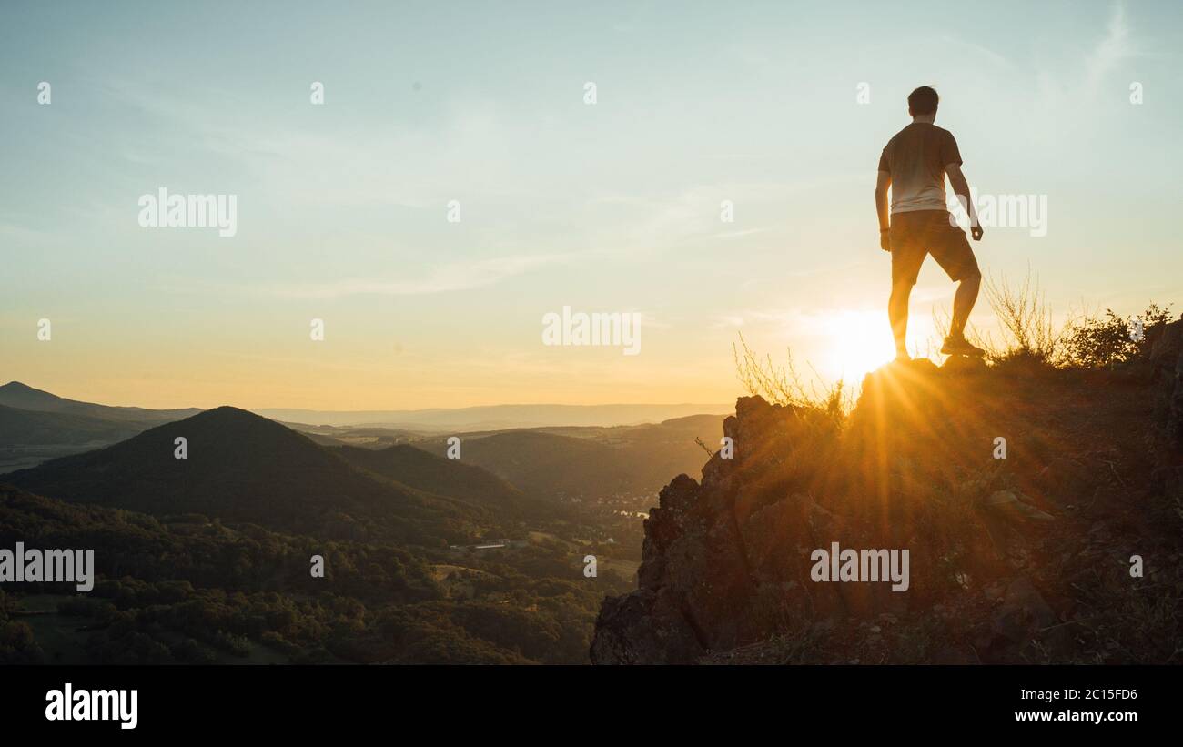 What is the meaning of climbing a mountain hires stock photography and