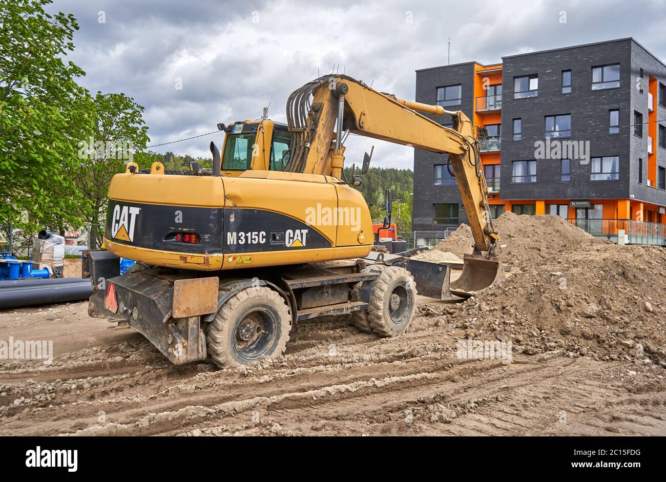 Huge excavator in construction site Stock Photo
