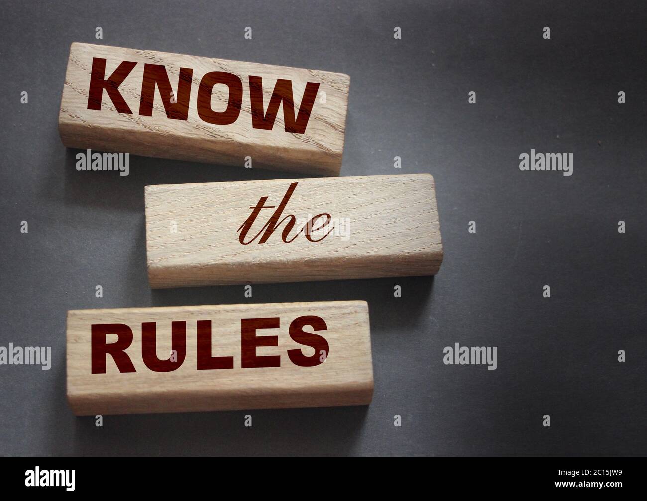 Know the rules word on wooden blocks isolated on dark grey background