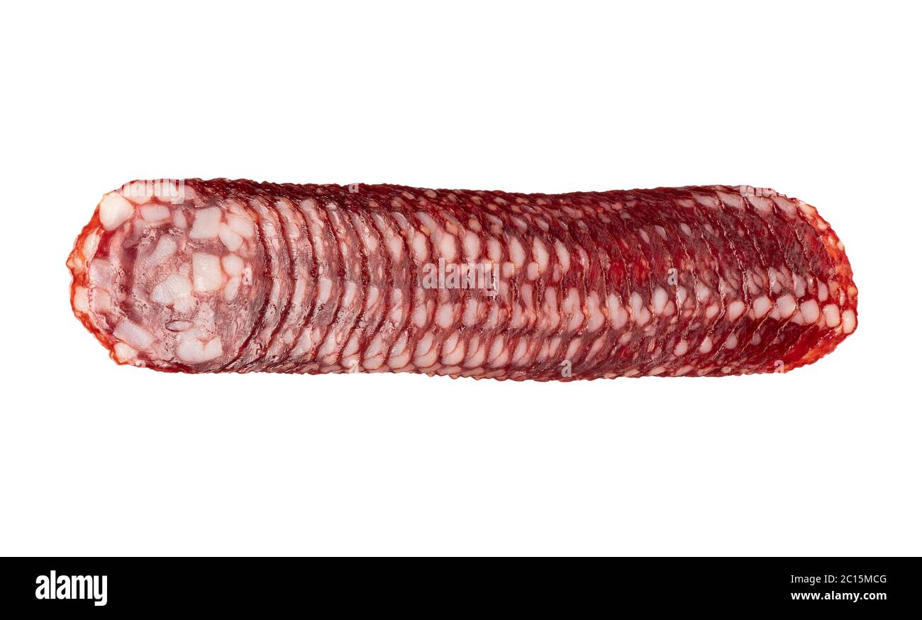 Top view of smoked pork salami chorizo sausages slices isolated on white background with