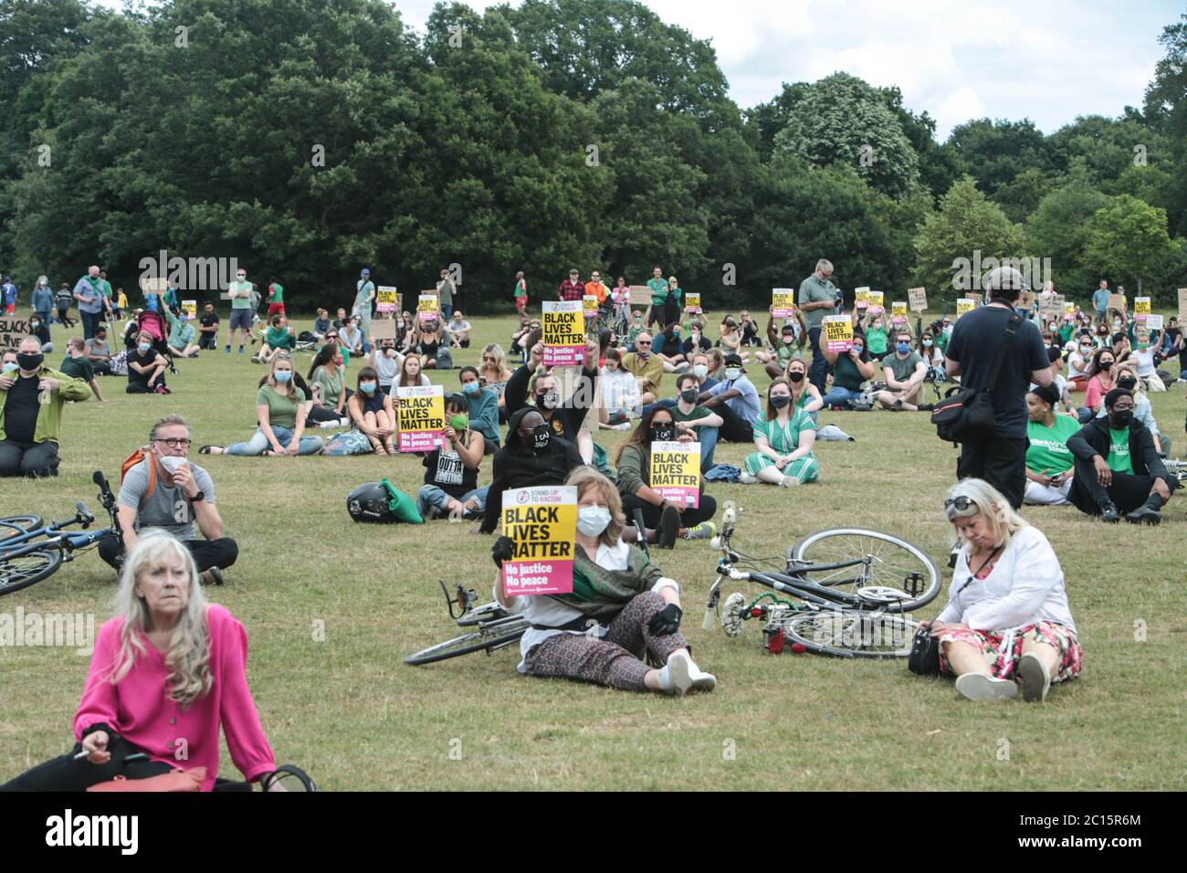 London UK 14 June 2020 Wandsworth Stand up to Racism and BLM , organised a peaceful protest on Tooting Common today. People who attended wore green as asked by the organisers to remember the 3rd anniversary of the fire at Greenfell. Paul Quezada-Neiman/Alamy Live News Stock Photo