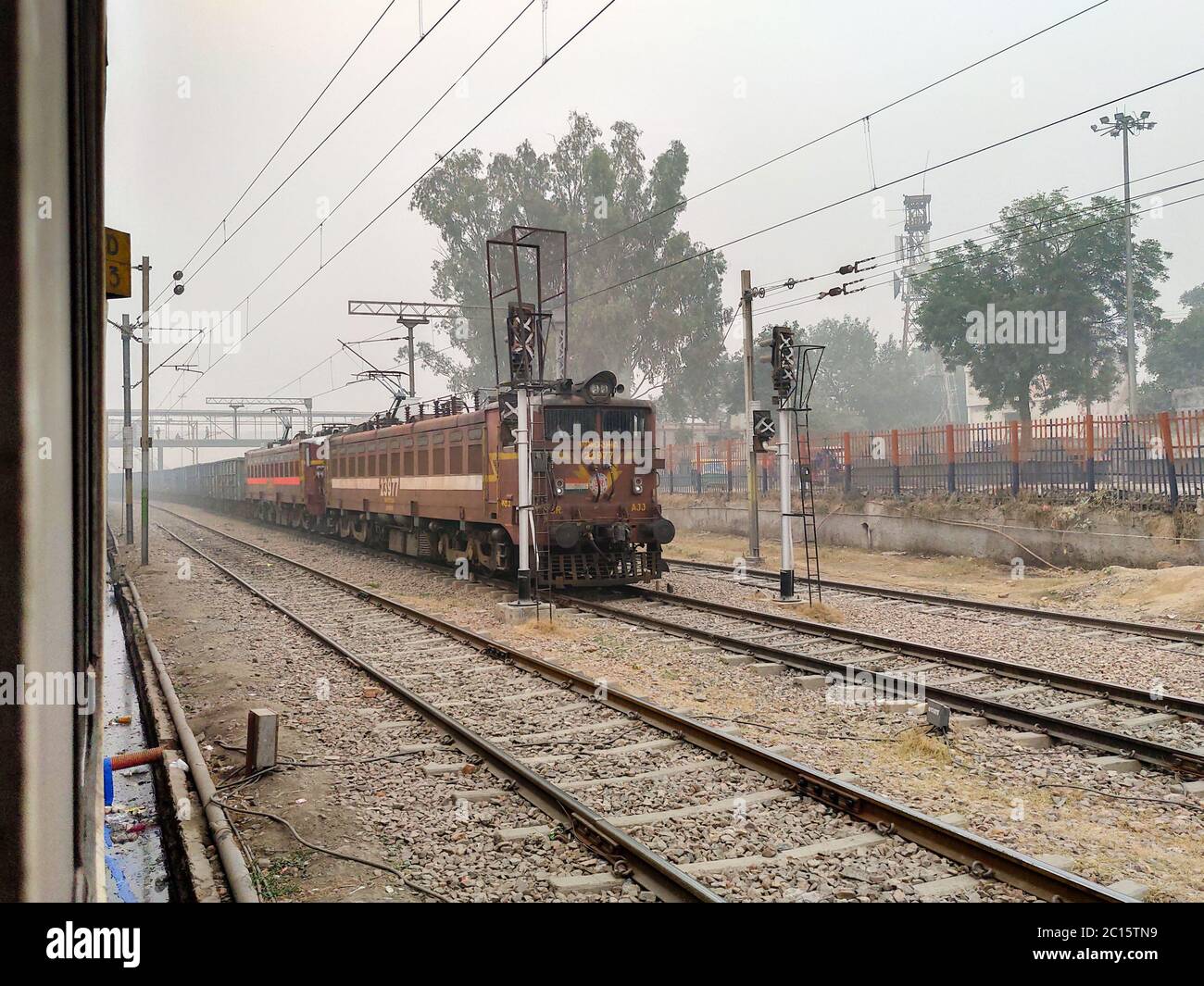 Editorial. Dated-18th April 2020, location - New Delhi.An Indian Frieght train. A forward view of outside the train door. Stock Photo
