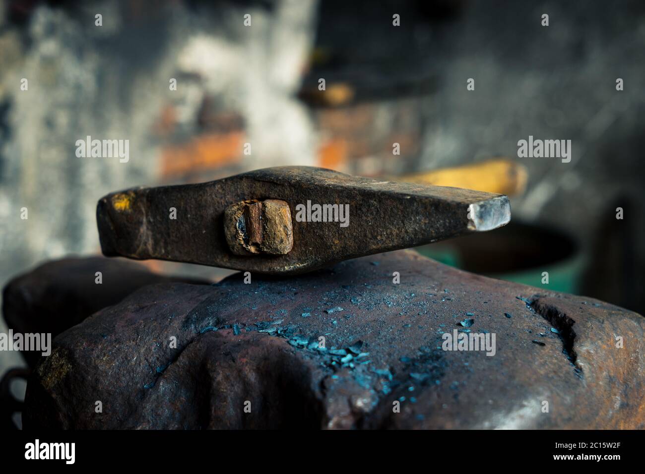 hammer and anvil in smithy Stock Photo