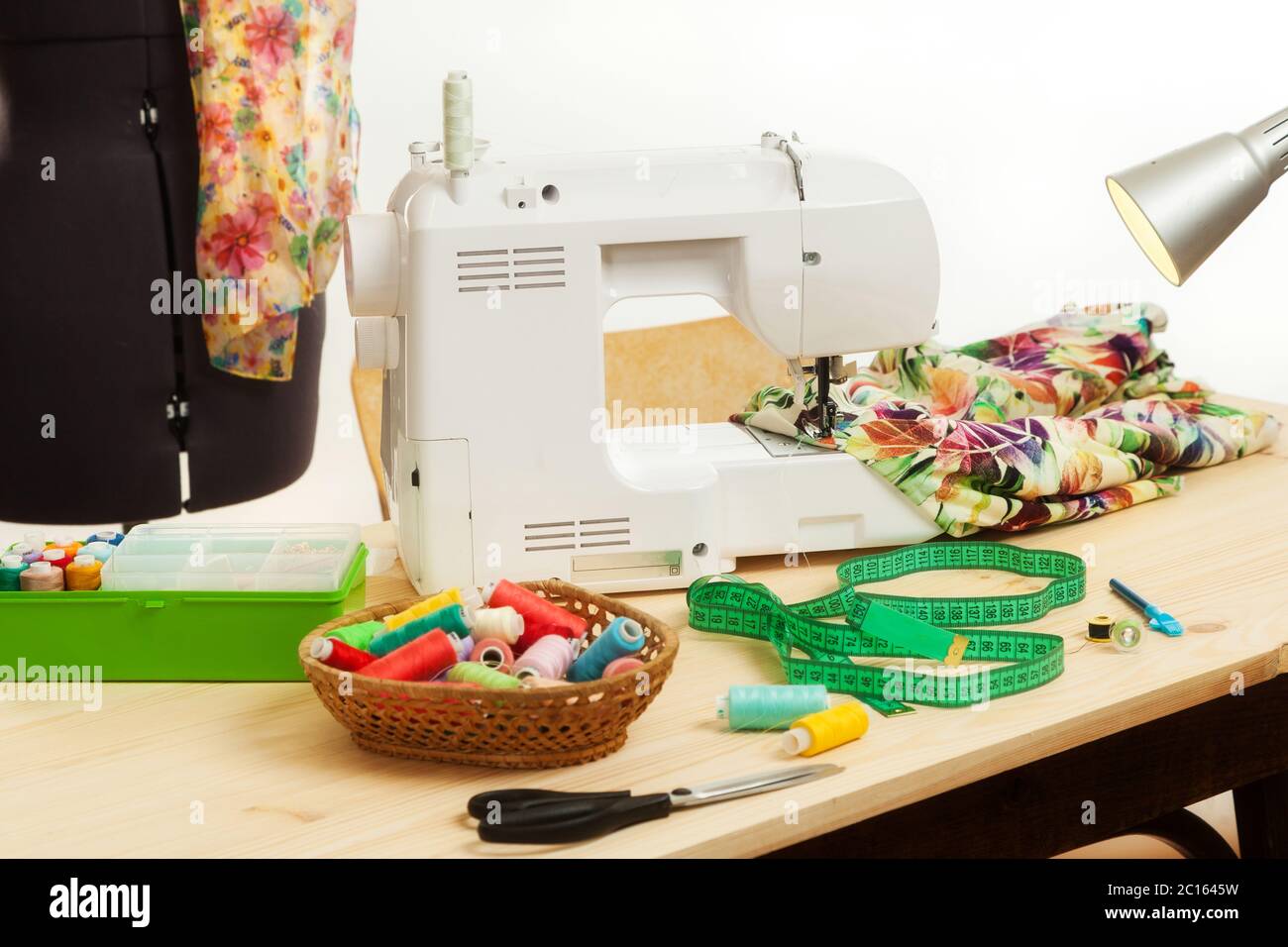 the sewing machine costs on a table Stock Photo Alamy