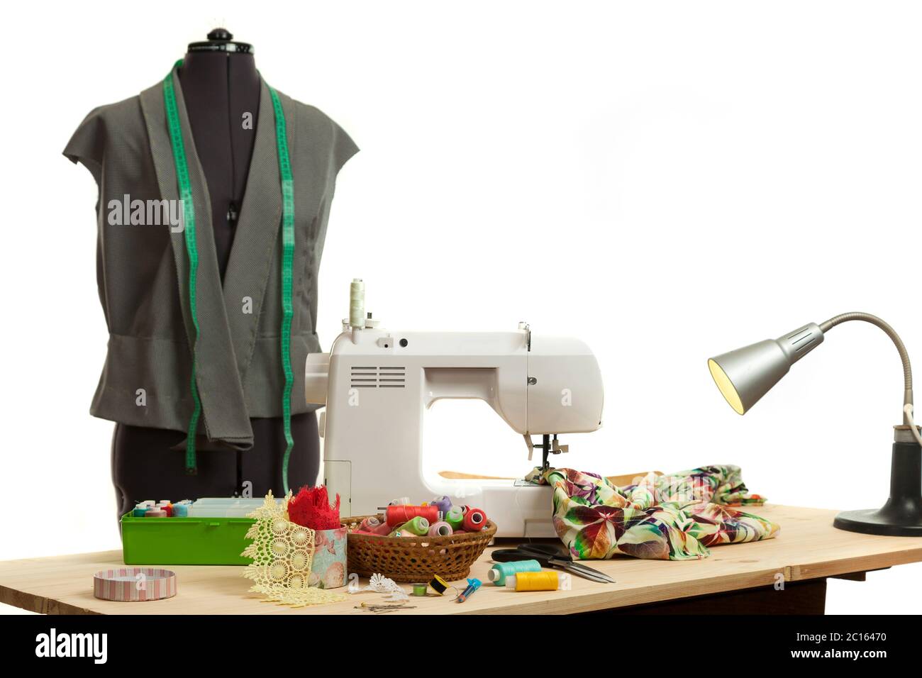 the sewing machine costs on a table Stock Photo