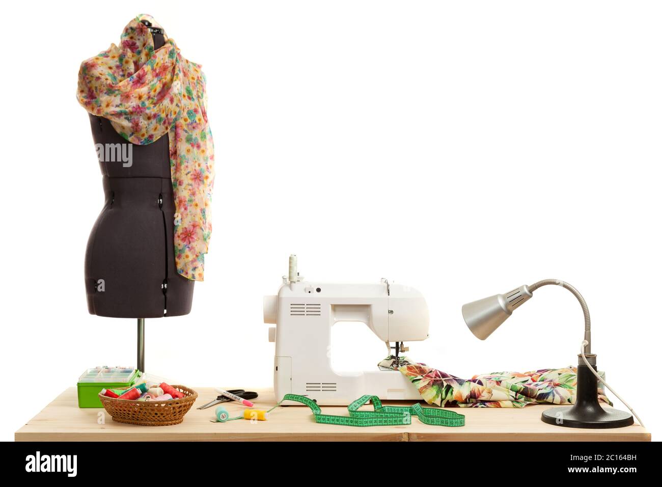 the sewing machine costs on a table Stock Photo Alamy