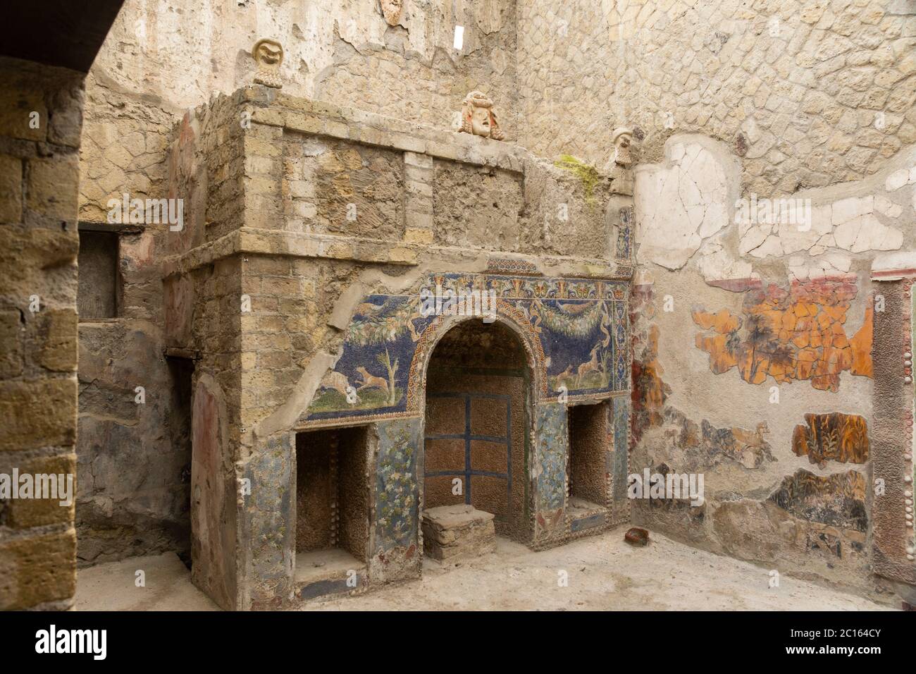 The colourful mosaics of the Nymphaeum - an artifical grotto and fountain - in the garden of the House of the Neptune Mosaic. Herculaneum, Italy Stock Photo