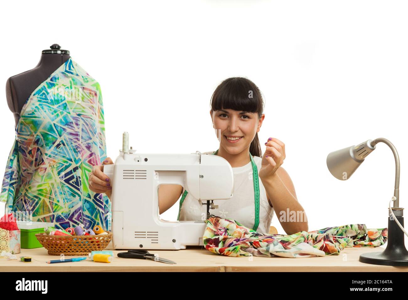 Tailor sews hi-res stock photography and images - Alamy