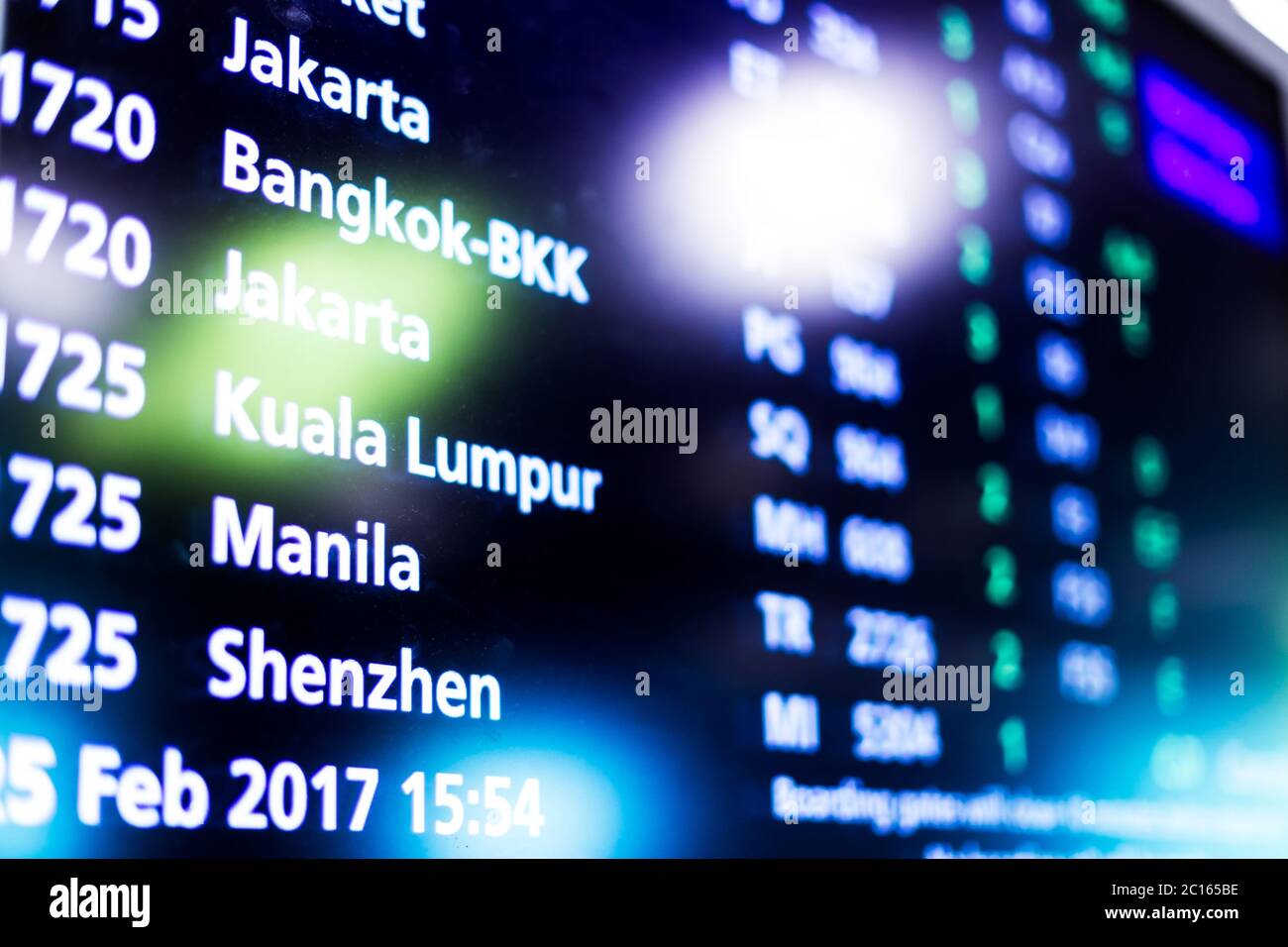 screen with flight information in airport Stock Photo - Alamy