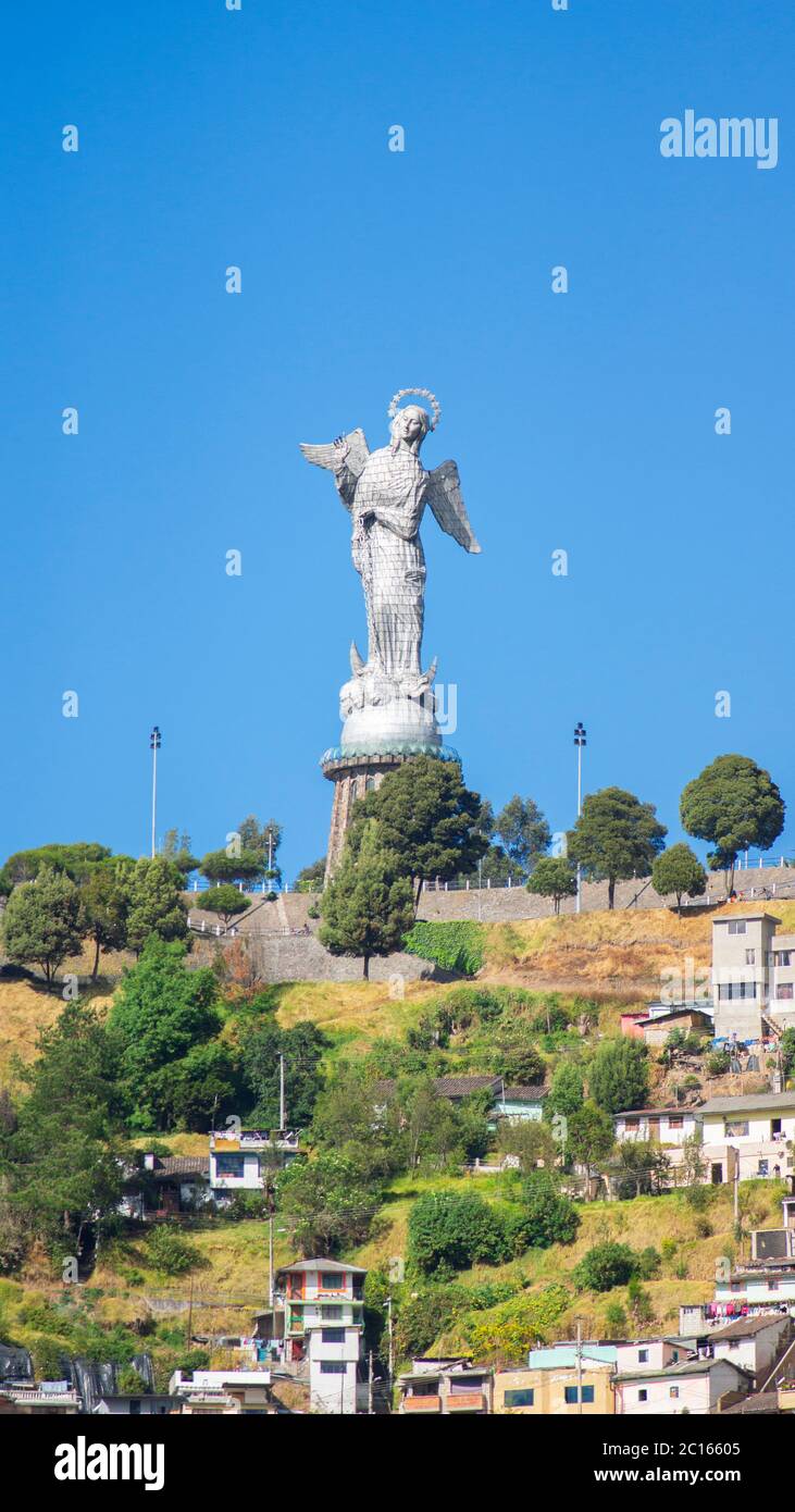 Quito, Pichincha / Ecuador - July 21 2018: Panoramic front view of the Virgen del Panecillo with blue sky background Stock Photo