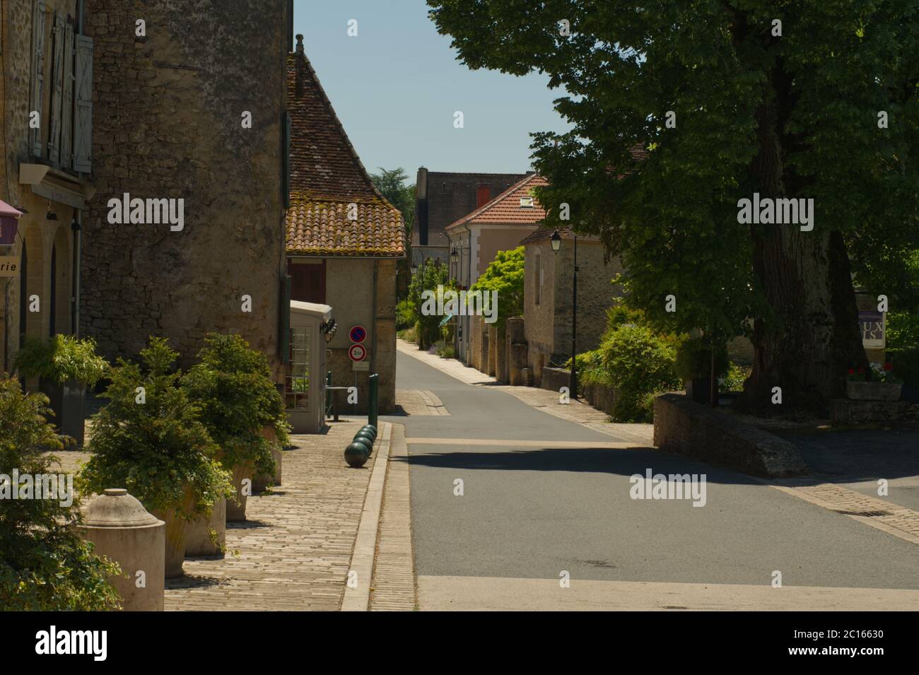 Desserted streets in Trémolat, Dordogne, France in the late spring shortly after the Covid-19 lockdown was lifted. Stock Photo