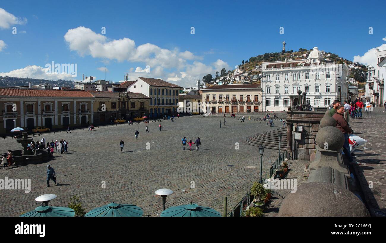 Quito, Pichincha / Ecuador - September 16 2018: People walking on San Francisco square with the virgin of El Panecillo in the background Stock Photo