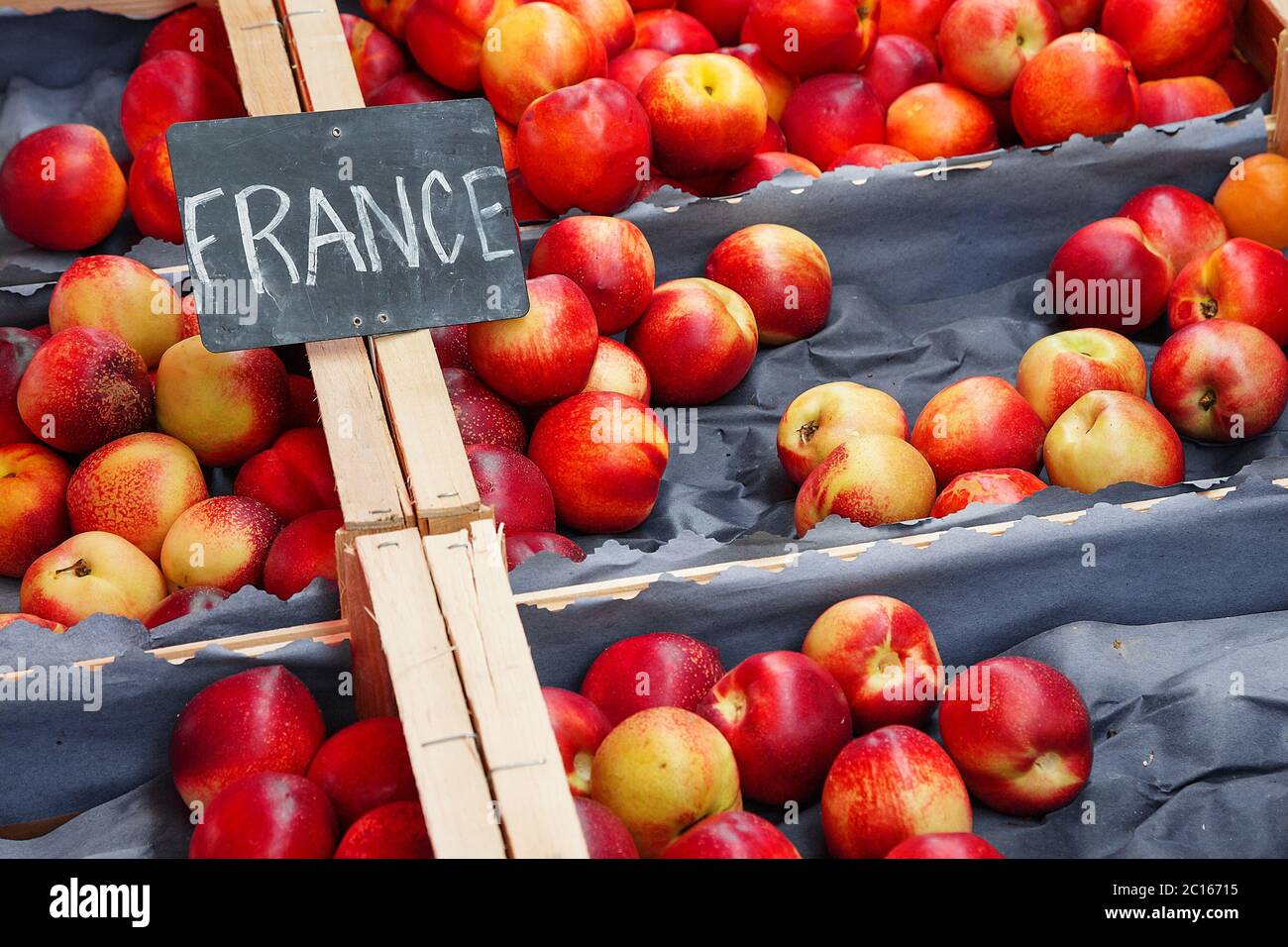 Nectarines form france for sale at a local market Stock Photo
