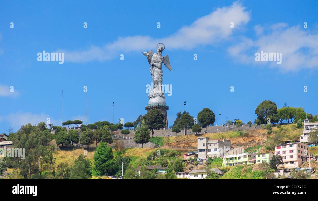 Quito, Pichincha / Ecuador - July 21 2018: Panoramic front view of the Virgen del Panecillo with blue sky background Stock Photo