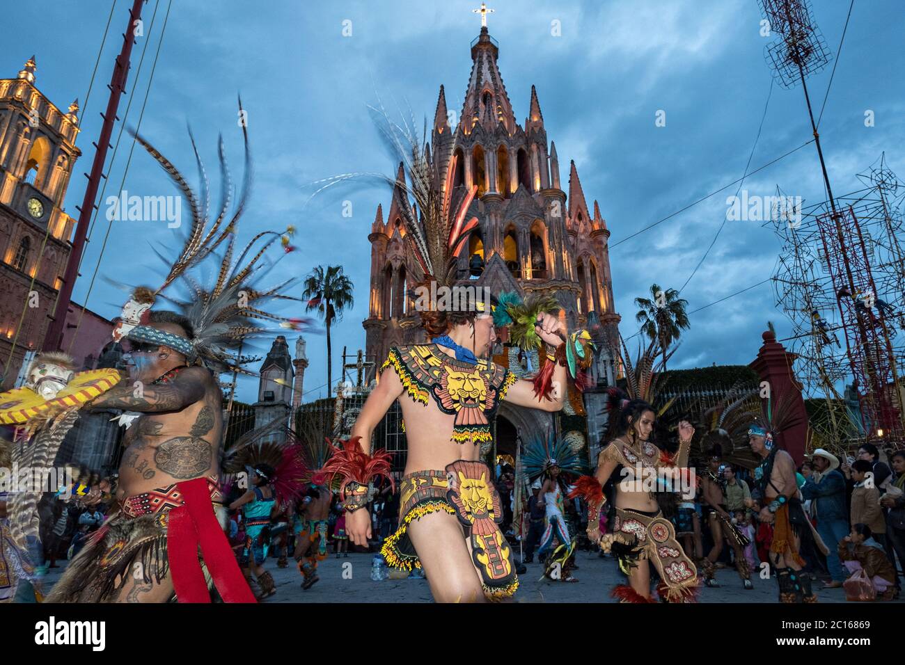 Mexican Concheros dance in a ceremony outside the Parroquia Church of Michael the Archangel during the week long fiesta of the patron saint Saint Michael October 1, 2017 in San Miguel de Allende, Mexico. Stock Photo