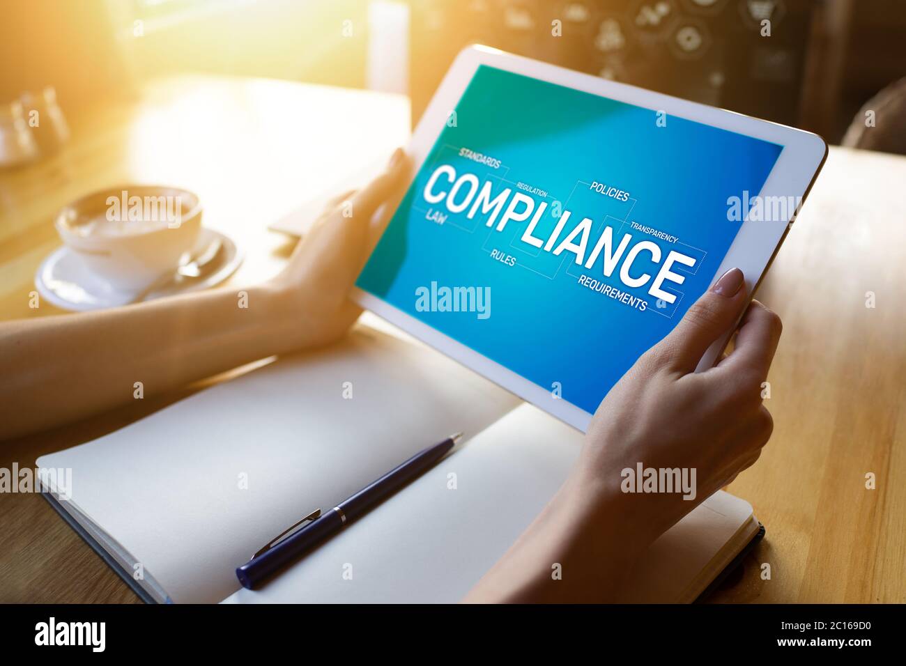 Compliance concept with icons and diagrams. Regulations, law, standards, requirements, audit. Concept on device screen Stock Photo