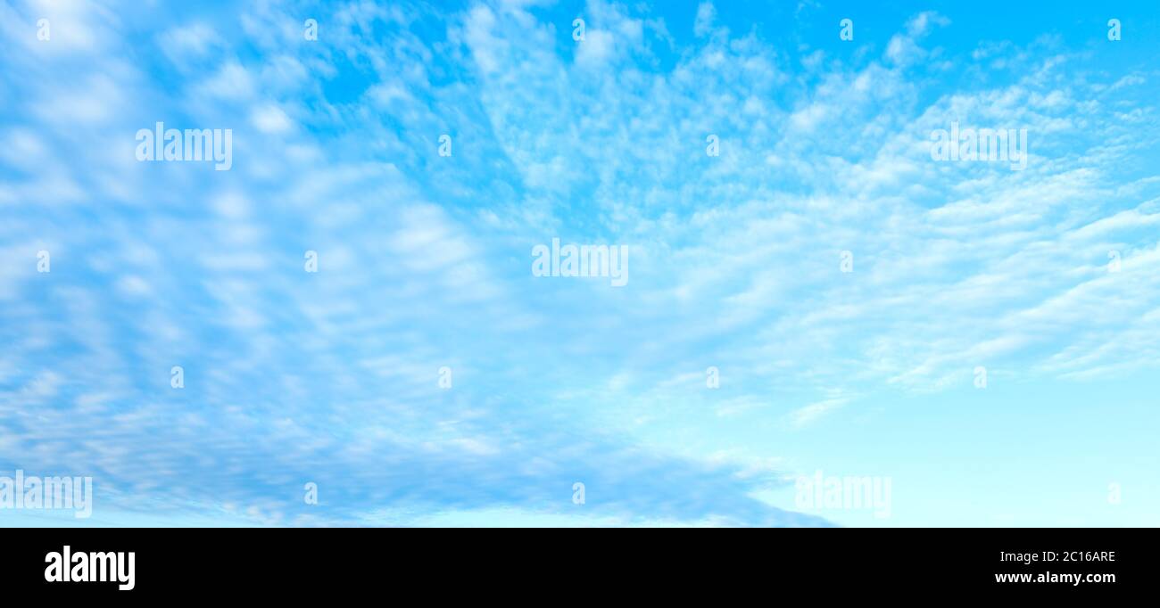 Blue sky background with clouds Stock Photo - Alamy