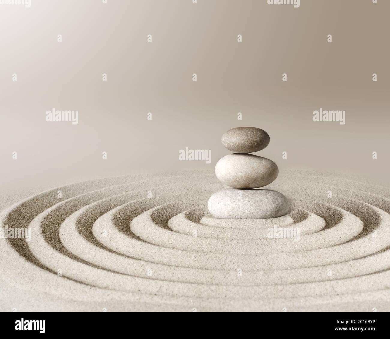 Japanese zen garden meditation stone, concentration and relaxation sand and rock for harmony and balance Stock Photo
