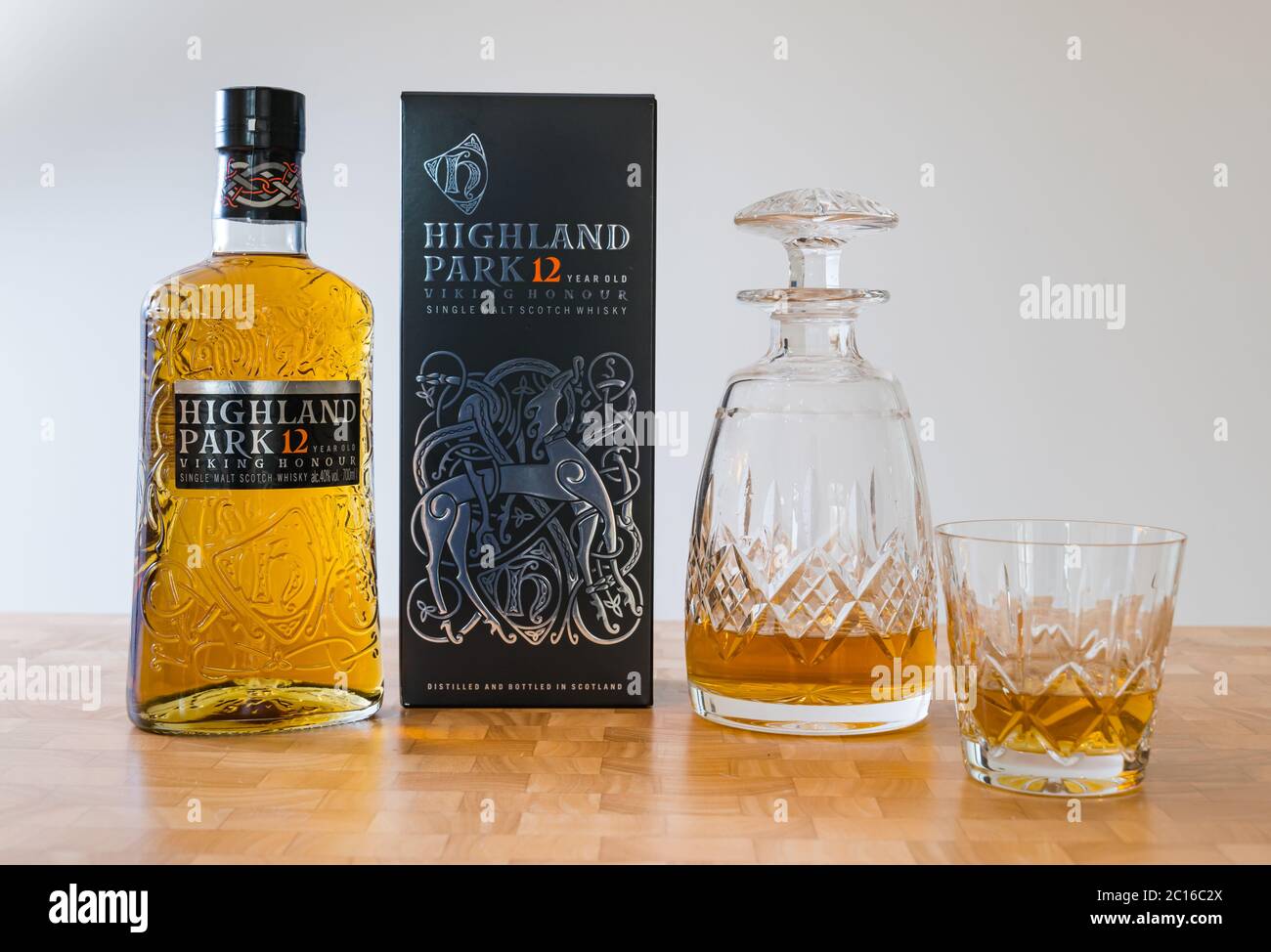 Highland Park Viking Honour Scotch malt whisky bottle with crystal decanter and whisky glass Stock Photo