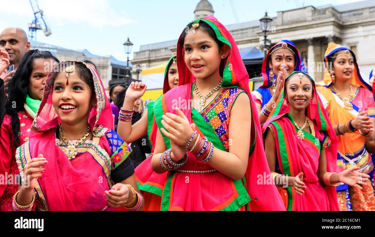 Children perform in traditional Rajastani dresses at Diwali on the Square, Diwali Festival Trafalgar Square, London, UK Stock Photo