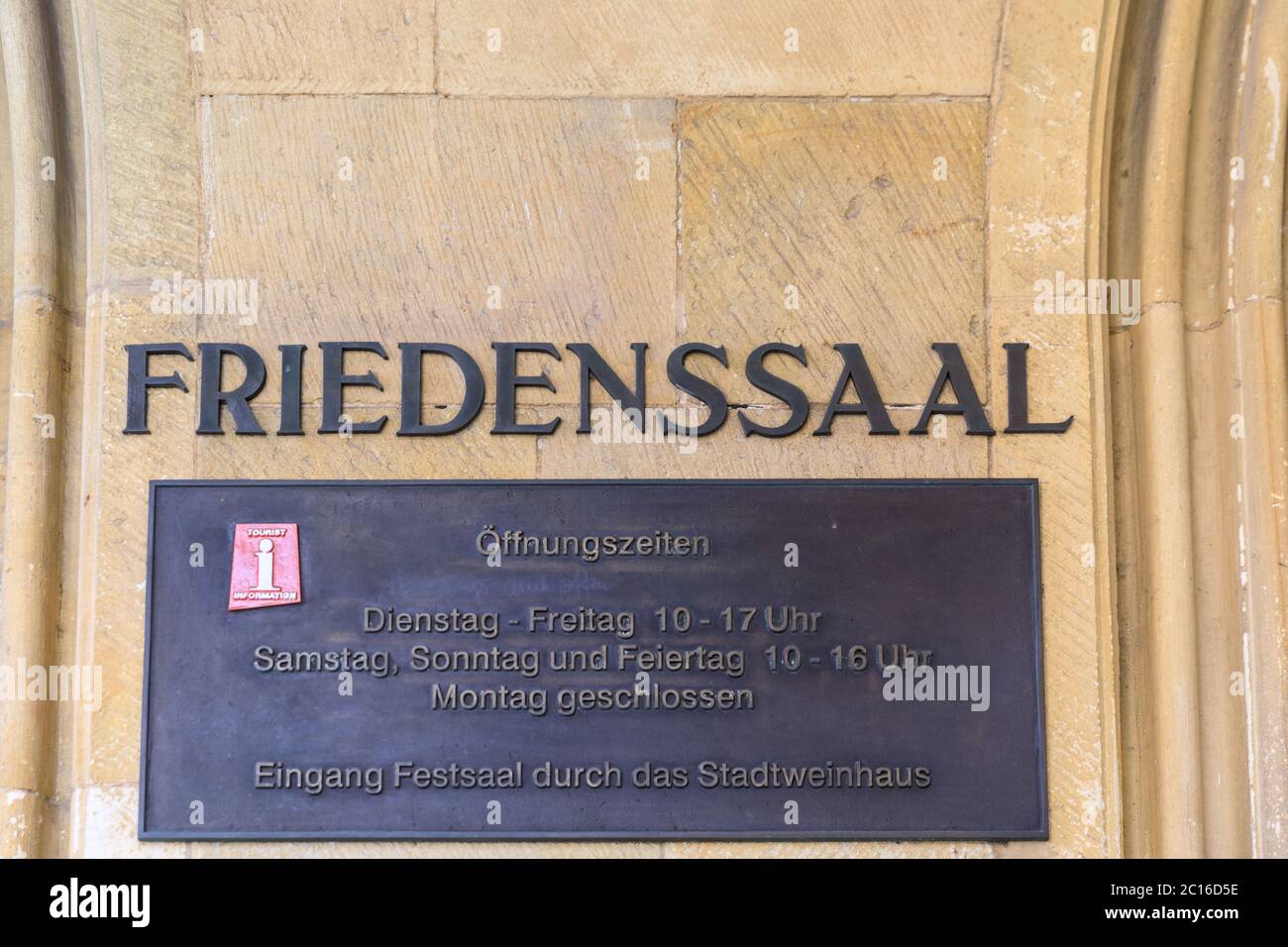 Friedenssaal sign at the entrance to the celebratory hall of the Peace of Westphalia at the historic City Hall, Münster, Germany Stock Photo
