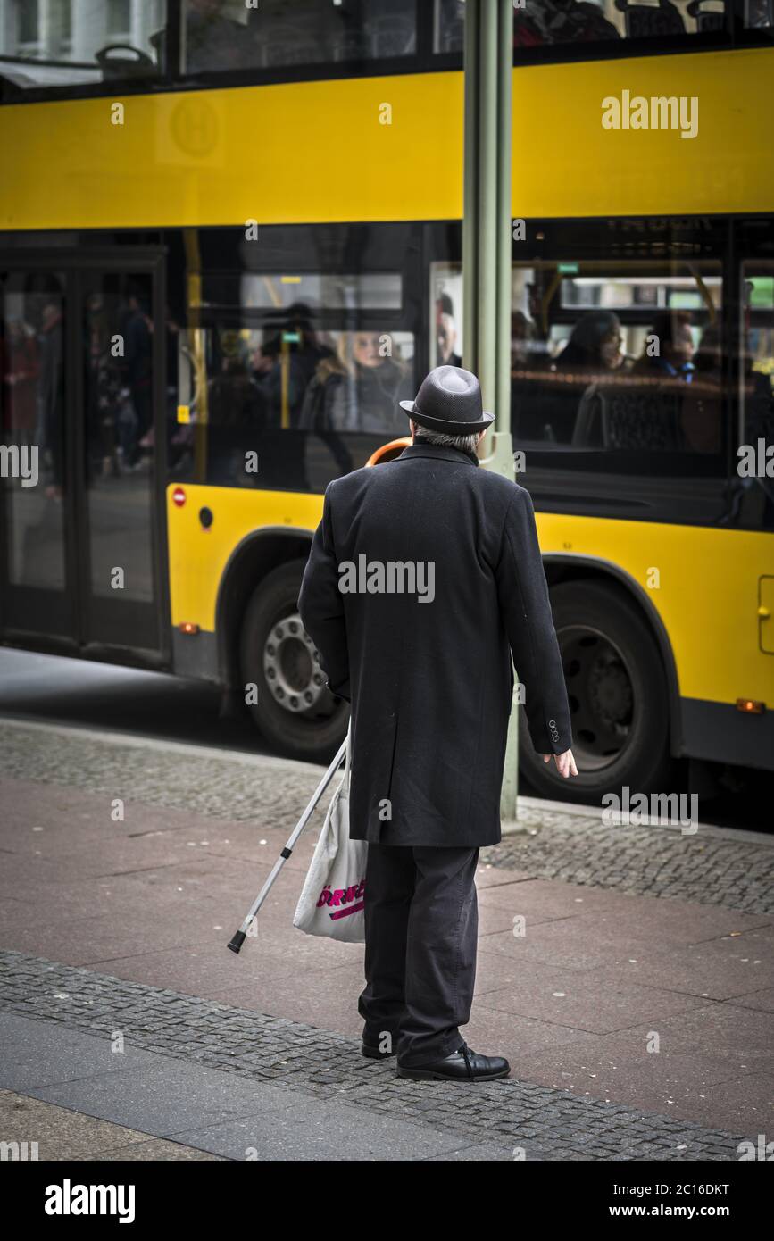 at the bus stop Stock Photo Alamy