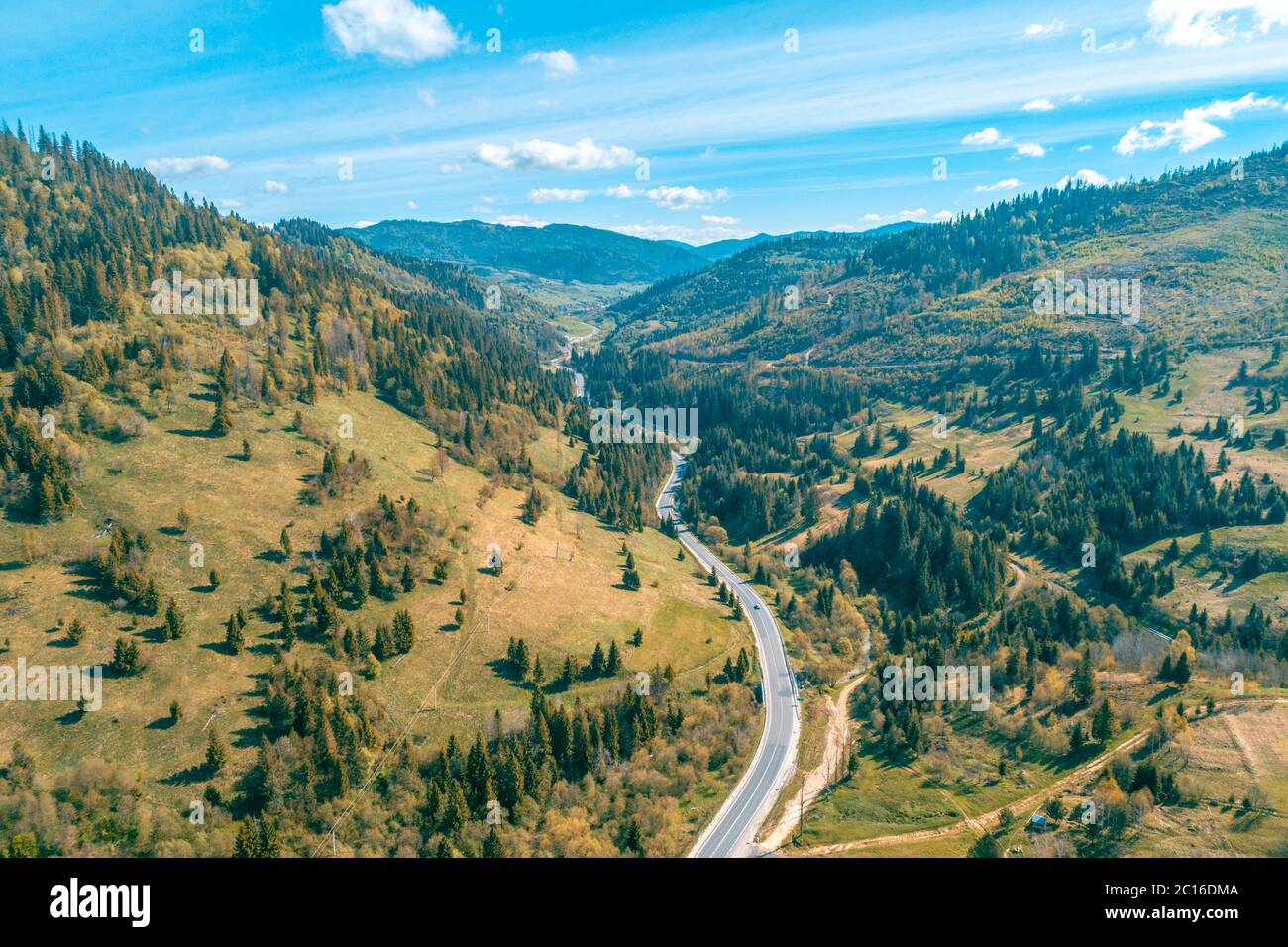 Aerial view of a mountain highway in spring. Beautiful mountain landscape. Carpathian mountains. Ukraine Stock Photo