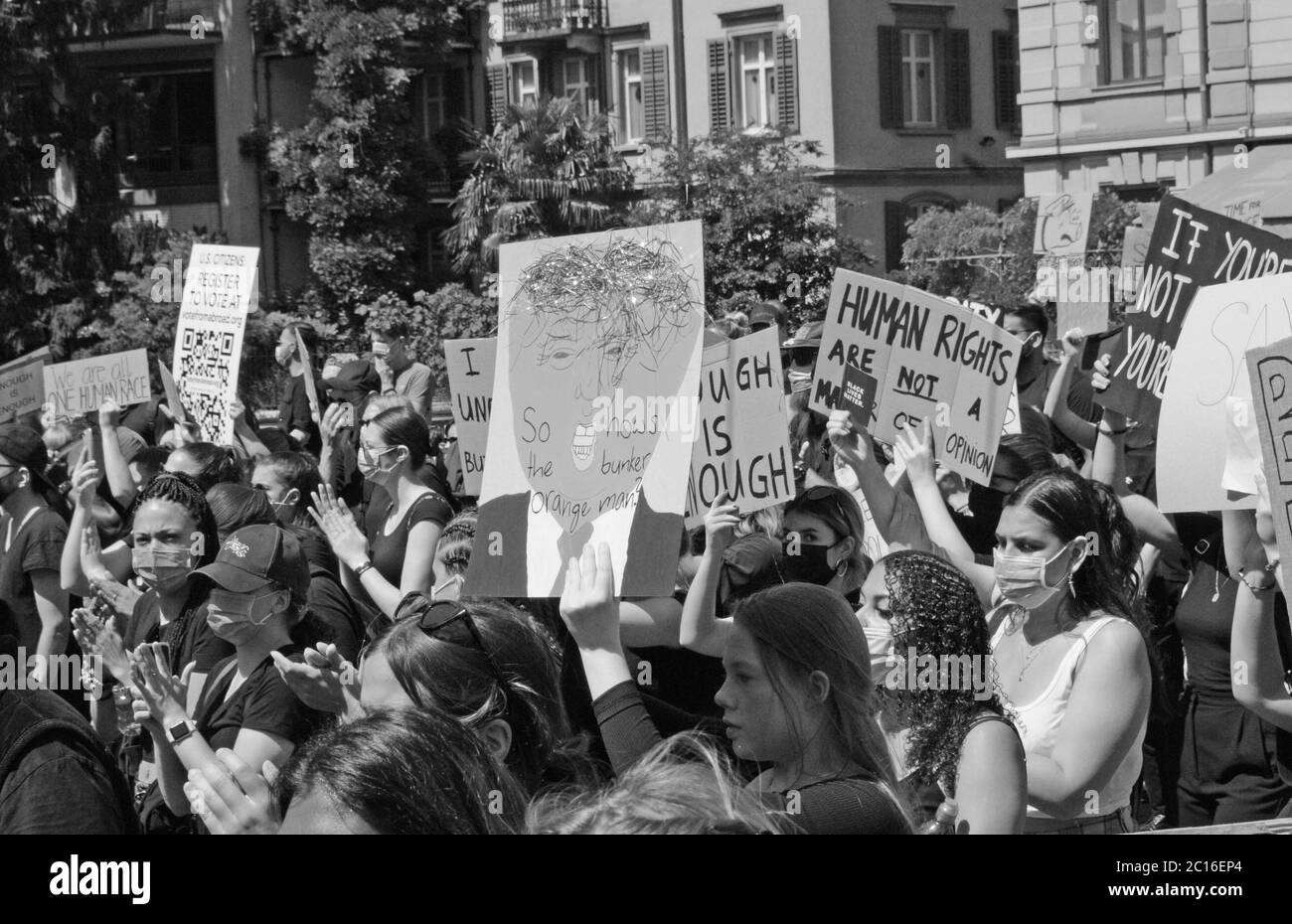 A huge demonstration of young, coloured, black and white people protesting against rassism and police brutality in Zürich City Stock Photo